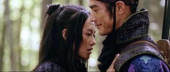 Movie still from “House of Flying Daggers” (2004), directed by Yimou Zhang – A man and a woman looking into each others eyes; Close Up shot, Over the shoulder angle