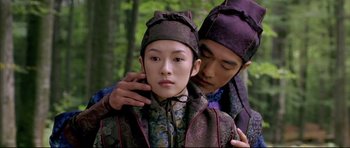 Movie still from “House of Flying Daggers” (2004), directed by Yimou Zhang – A man and a woman in oriental clothing; Medium shot, Over the shoulder angle