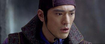 Movie still from “House of Flying Daggers” (2004), directed by Yimou Zhang – A person wearing a hat; Close Up shot, High angle