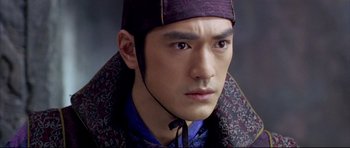 Movie still from “House of Flying Daggers” (2004), directed by Yimou Zhang – A person wearing a hat; Close Up shot, High angle