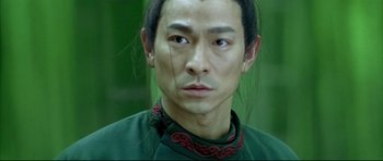 Movie still from “House of Flying Daggers” (2004), directed by Yimou Zhang – A person with long black hair; Close Up shot, High angle