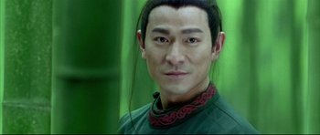 Movie still from “House of Flying Daggers” (2004), directed by Yimou Zhang – A person with long black hair; Close Up shot, Low angle