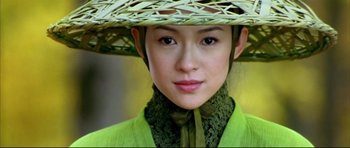 Movie still from “House of Flying Daggers” (2004), directed by Yimou Zhang – A person wearing a hat; Close Up shot, Low angle