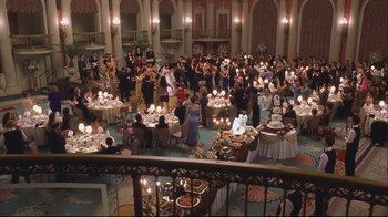 Movie still from “House of Sand and Fog” (2003), directed by Vadim Perelman – A large group of people standing around a banquet hall; Extreme Wide shot, High angle
