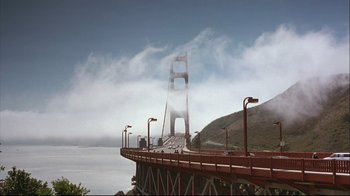 Movie still from “House of Sand and Fog” (2003), directed by Vadim Perelman – A view of the golden gate bridge in the fog; Extreme Wide shot, High angle