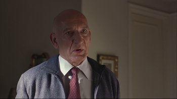 Movie still from “House of Sand and Fog” (2003), directed by Vadim Perelman – An older man wearing a jacket and a tie; Close Up shot, Low angle