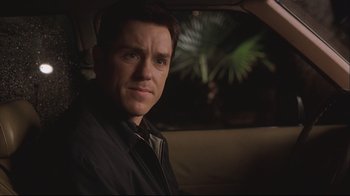 Movie still from “House of Sand and Fog” (2003), directed by Vadim Perelman – A person sitting in a car; Close Up shot, Over the shoulder angle