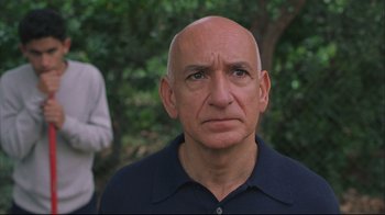 Movie still from “House of Sand and Fog” (2003), directed by Vadim Perelman – An older bald man is looking at the camera; Close Up shot, Low angle