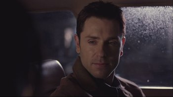 Movie still from “House of Sand and Fog” (2003), directed by Vadim Perelman – A person sitting in a car; Close Up shot, Over the shoulder angle