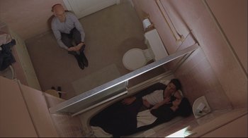 Movie still from “House of Sand and Fog” (2003), directed by Vadim Perelman – An overhead view of two people sitting in a bath tub; Wide shot, Overhead angle