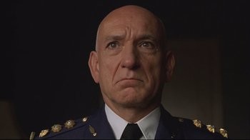 Movie still from “House of Sand and Fog” (2003), directed by Vadim Perelman – A man in a military uniform is looking straight ahead; Close Up shot, Low angle