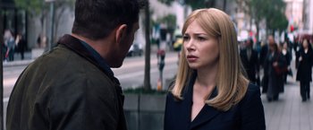 Movie still from “Venom” (2018), directed by Ruben Fleischer – A man and a woman standing next to each other on the street; Close Up shot, Over the shoulder angle