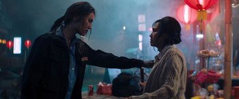 Movie still from “Venom” (2018), directed by Ruben Fleischer – Two people are fighting in a room; Medium shot, Over the shoulder angle