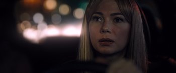 Movie still from “Venom” (2018), directed by Ruben Fleischer – A person in a car at night; Close Up shot, Over the shoulder angle