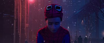 Movie still from “Venom” (2018), directed by Ruben Fleischer – A man in a spider - man costume is looking down at his face; Close Up shot, Low angle