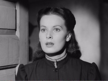 Movie still from “How Green Was My Valley” (1941), directed by John Ford – An old black and white photo of a woman; Close Up shot, Low angle