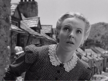 Movie still from “How Green Was My Valley” (1941), directed by John Ford – An old photo of a woman in a black and white photo; Close Up shot, Low angle