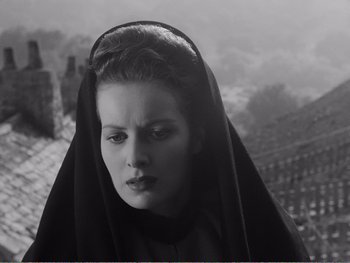 Movie still from “How Green Was My Valley” (1941), directed by John Ford – A black and white photo of a woman wearing a black veil; Close Up shot, Low angle