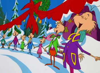 Movie still from “How the Grinch Stole Christmas!” (1966), directed by Ben Washam – A group of people standing next to each other in the snow; Medium shot, Low angle