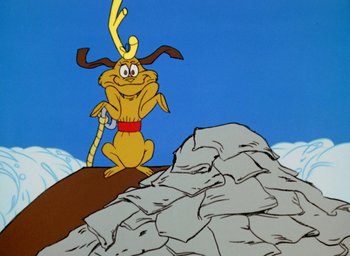 Movie still from “How the Grinch Stole Christmas!” (1966), directed by Ben Washam – A painting of a dog with a stick in its mouth; Medium shot, Low angle