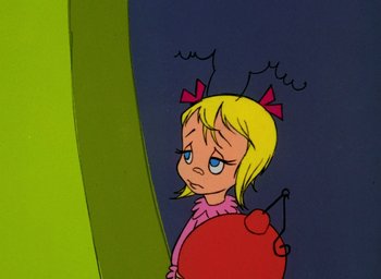 Movie still from “How the Grinch Stole Christmas!” (1966), directed by Ben Washam – A cartoon of a little girl looking sad; Close Up shot, High angle
