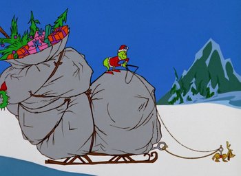 Movie still from “How the Grinch Stole Christmas!” (1966), directed by Ben Washam – A drawing of a person on a sled with a bag of presents on top of it; Extreme Wide shot, Low angle