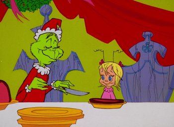 Movie still from “How the Grinch Stole Christmas!” (1966), directed by Ben Washam – A cartoon of the grinch and cindy lou who; Medium shot, High angle