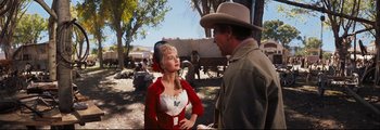 Movie still from “How the West Was Won” (1962), directed by George Marshall – A man and a woman talking in front of an old wagon; Medium shot, Over the shoulder angle