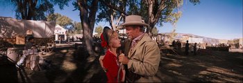 Movie still from “How the West Was Won” (1962), directed by George Marshall – A man and a woman dressed in western clothing; Medium shot, Low angle