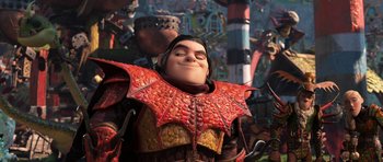 Movie still from “How to Train Your Dragon: The Hidden World” (2019), directed by Dean DeBlois – A person wearing a red and yellow costume; Medium shot, Low angle