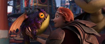 Movie still from “How to Train Your Dragon: The Hidden World” (2019), directed by Dean DeBlois – A woman holding a purple frog in her hand; Medium shot, Over the shoulder angle