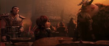 Movie still from “How to Train Your Dragon: The Hidden World” (2019), directed by Dean DeBlois – A young boy sitting in front of a fireplace; Medium shot, Over the shoulder angle