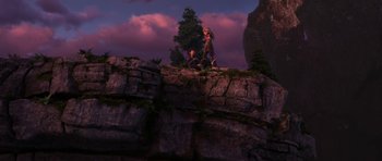 Movie still from “How to Train Your Dragon: The Hidden World” (2019), directed by Dean DeBlois – Two people standing on top of a rock formation; Extreme Wide shot, High angle