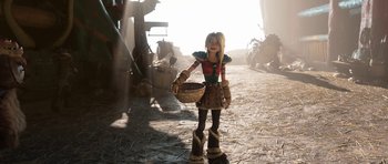 Movie still from “How to Train Your Dragon: The Hidden World” (2019), directed by Dean DeBlois – A young girl is holding a wicker basket; Wide shot, Low angle