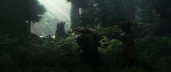 Movie still from “How to Train Your Dragon: The Hidden World” (2019), directed by Dean DeBlois – A group of people that are standing in the woods; Wide shot, High angle
