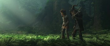 Movie still from “How to Train Your Dragon: The Hidden World” (2019), directed by Dean DeBlois – A couple of people that are in the grass; Wide shot, Low angle