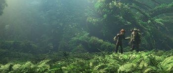 Movie still from “How to Train Your Dragon: The Hidden World” (2019), directed by Dean DeBlois – A man standing in a lush green forest; Extreme Wide shot, High angle