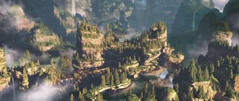 Movie still from “How to Train Your Dragon: The Hidden World” (2019), directed by Dean DeBlois – An aerial view of a forest with a bridge in the middle of it; Extreme Wide shot, High angle