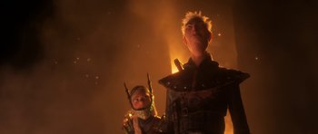 Movie still from “How to Train Your Dragon: The Hidden World” (2019), directed by Dean DeBlois – A young child and an older person are standing in a dark room; Medium shot, Low angle