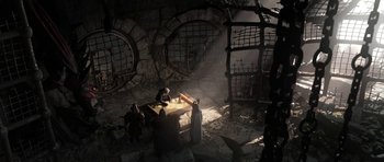 Movie still from “How to Train Your Dragon: The Hidden World” (2019), directed by Dean DeBlois – A group of people standing around a table in a room; Wide shot, High angle