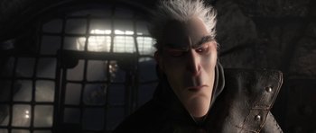 Movie still from “How to Train Your Dragon: The Hidden World” (2019), directed by Dean DeBlois – A man with white hair is looking down; Close Up shot, Over the shoulder angle
