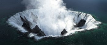 Movie still from “How to Train Your Dragon: The Hidden World” (2019), directed by Dean DeBlois – A large body of water with rocks in the water; Extreme Wide shot, High angle