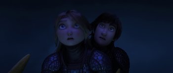Movie still from “How to Train Your Dragon: The Hidden World” (2019), directed by Dean DeBlois – A couple of people that are looking up at something; Close Up shot, Low angle