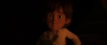 Movie still from “How to Train Your Dragon: The Hidden World” (2019), directed by Dean DeBlois – A boy is looking at the camera in the dark; Close Up shot, Low angle