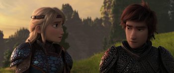Movie still from “How to Train Your Dragon: The Hidden World” (2019), directed by Dean DeBlois – A couple of people standing next to each other on top of a hill; Close Up shot, Over the shoulder angle