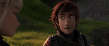 Movie still from “How to Train Your Dragon: The Hidden World” (2019), directed by Dean DeBlois – A person's face in a grassy area; Close Up shot, Low angle