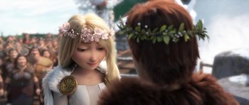 Movie still from “How to Train Your Dragon: The Hidden World” (2019), directed by Dean DeBlois – A woman wearing a flower crown is looking at a man; Close Up shot, Over the shoulder angle
