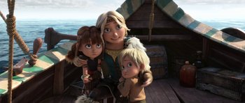 Movie still from “How to Train Your Dragon: The Hidden World” (2019), directed by Dean DeBlois – A woman and two children are standing on a boat; Medium shot, High angle
