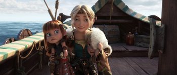 Movie still from “How to Train Your Dragon: The Hidden World” (2019), directed by Dean DeBlois – A woman holding a stuffed animal next to another woman; Medium shot, High angle