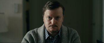 Movie still from “Hustlers” (2019), directed by Lorene Scafaria – A person wearing a jacket; Close Up shot, Low angle